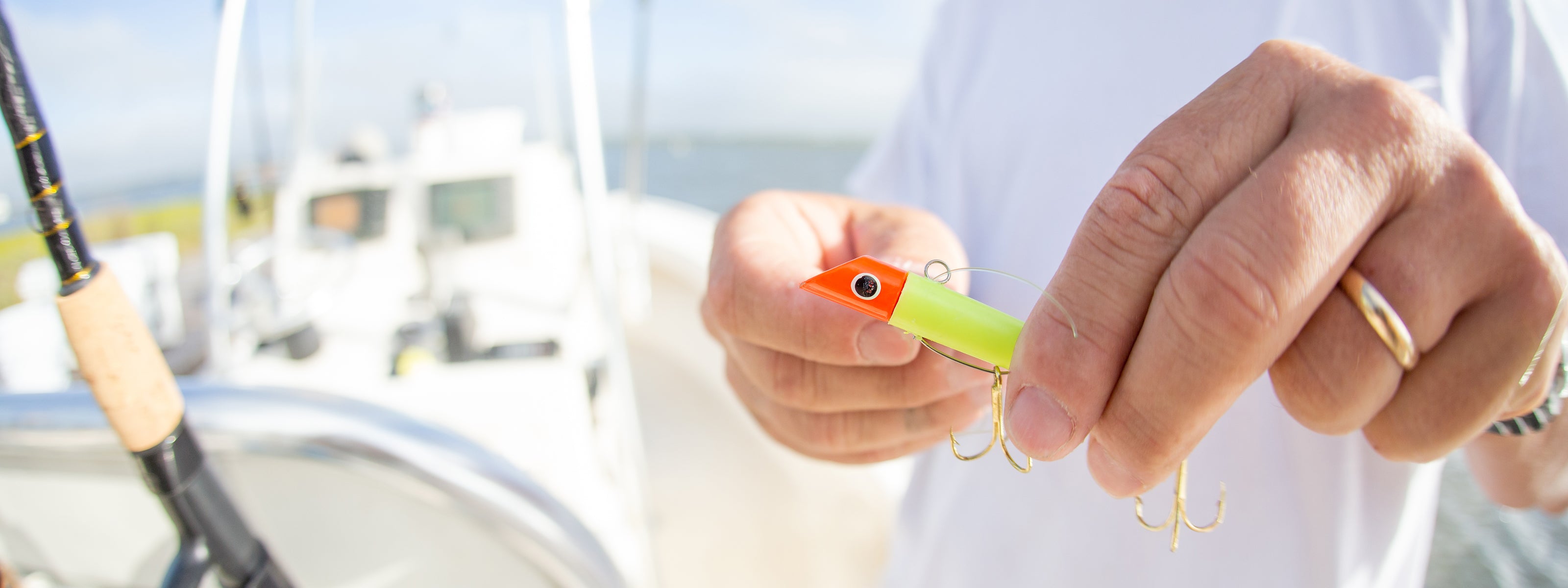 Got-cha plug lure being tied to line