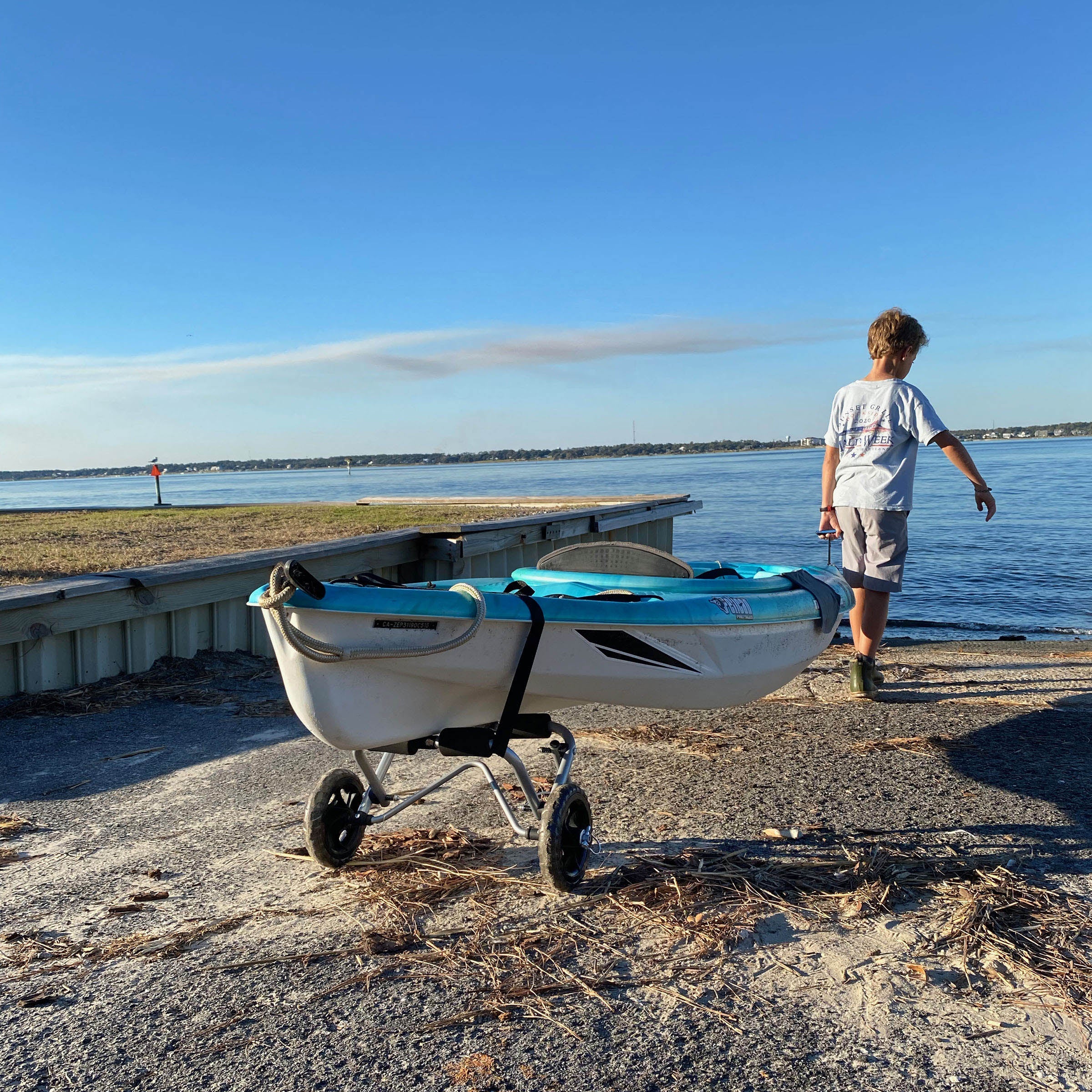 Mini kayak wheel kit on boat ramp