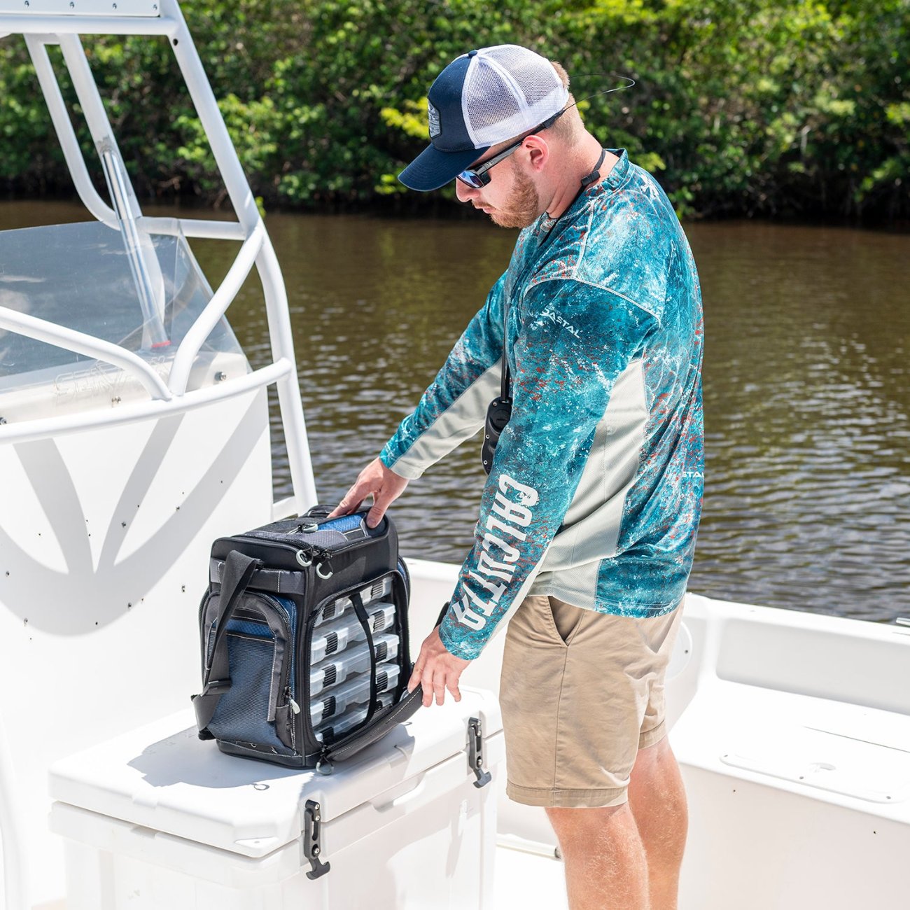 Calcutta Explorer Shoulder 5-Tray Tackle Bag with tackle trays on boat