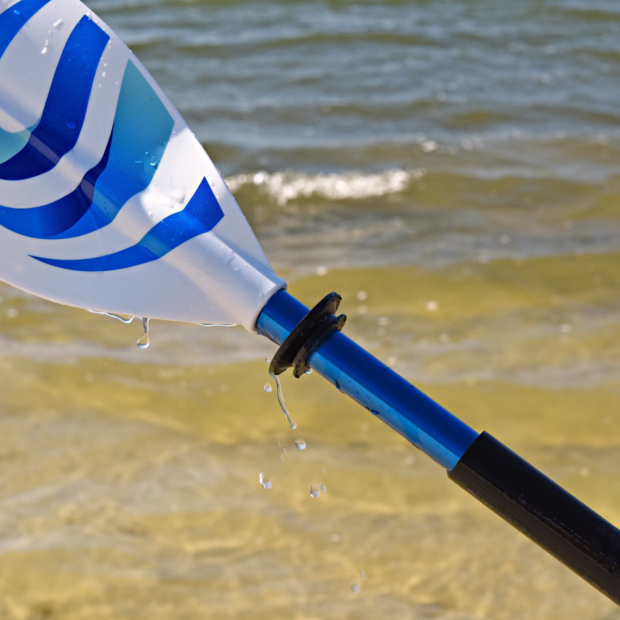 Kayak paddle drip ring on paddle