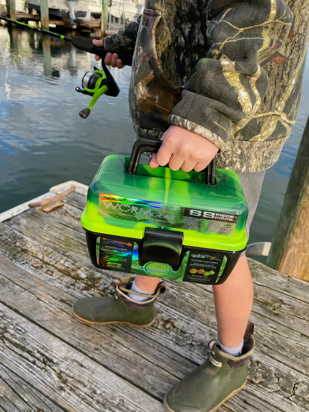 Worm Gear tackle box in youth hand