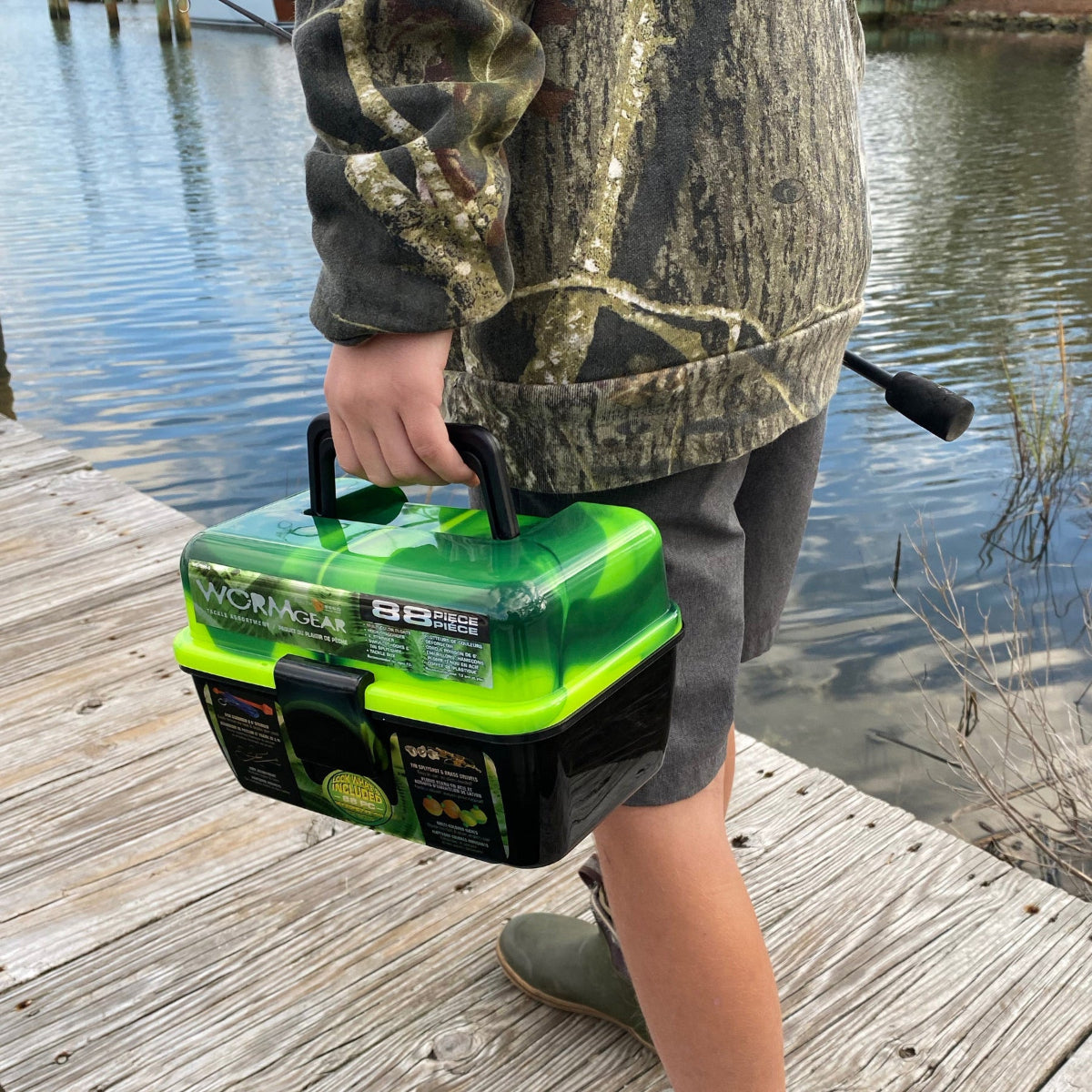 Youth angler with Worm Gear 88 piece tackle box