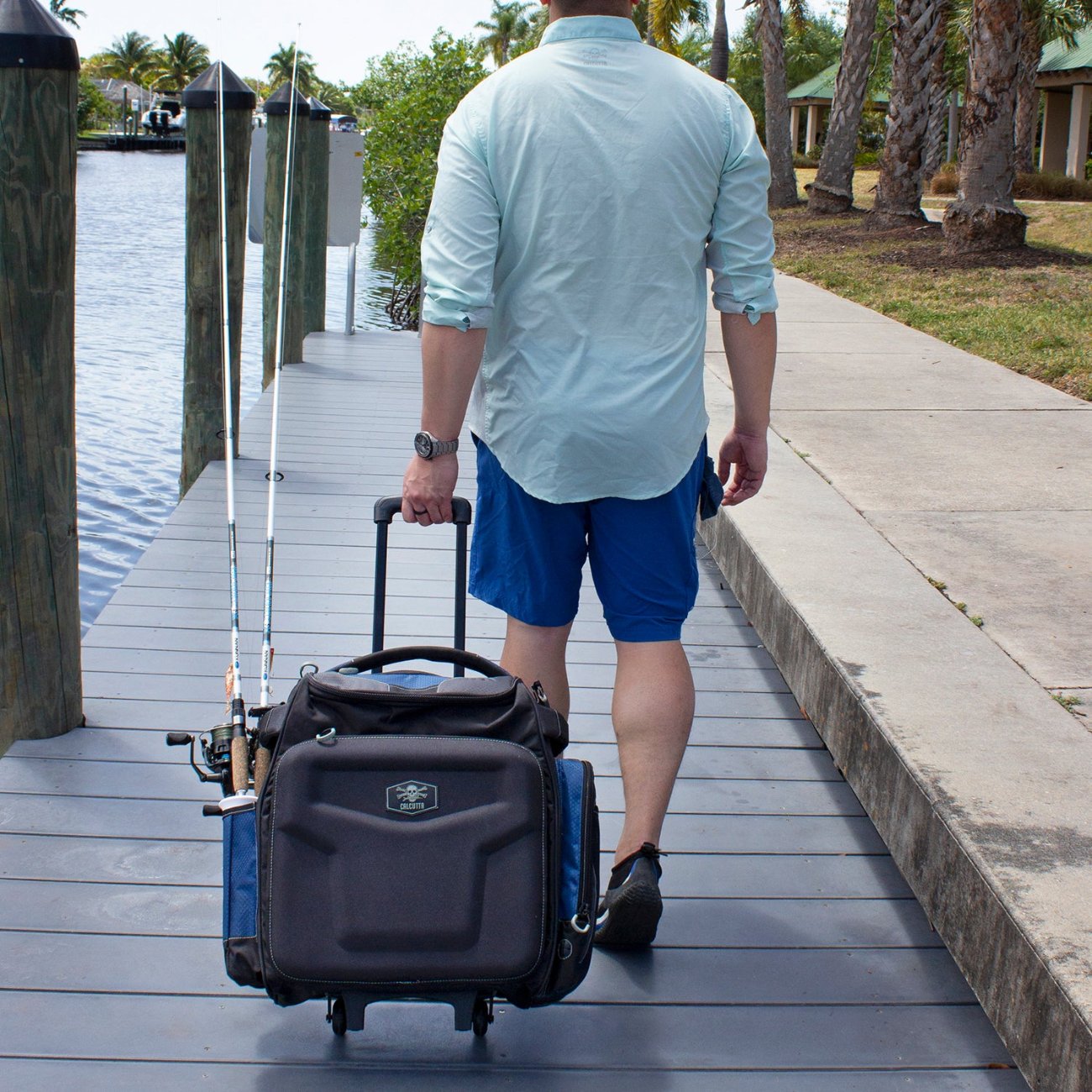 Calcutta Explorer rolling tackle bag on dock