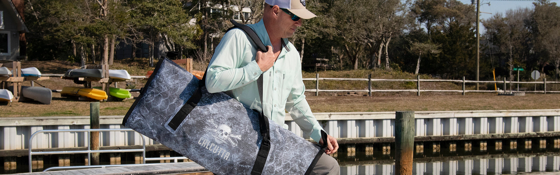 Fisherman with Pack fish cooler