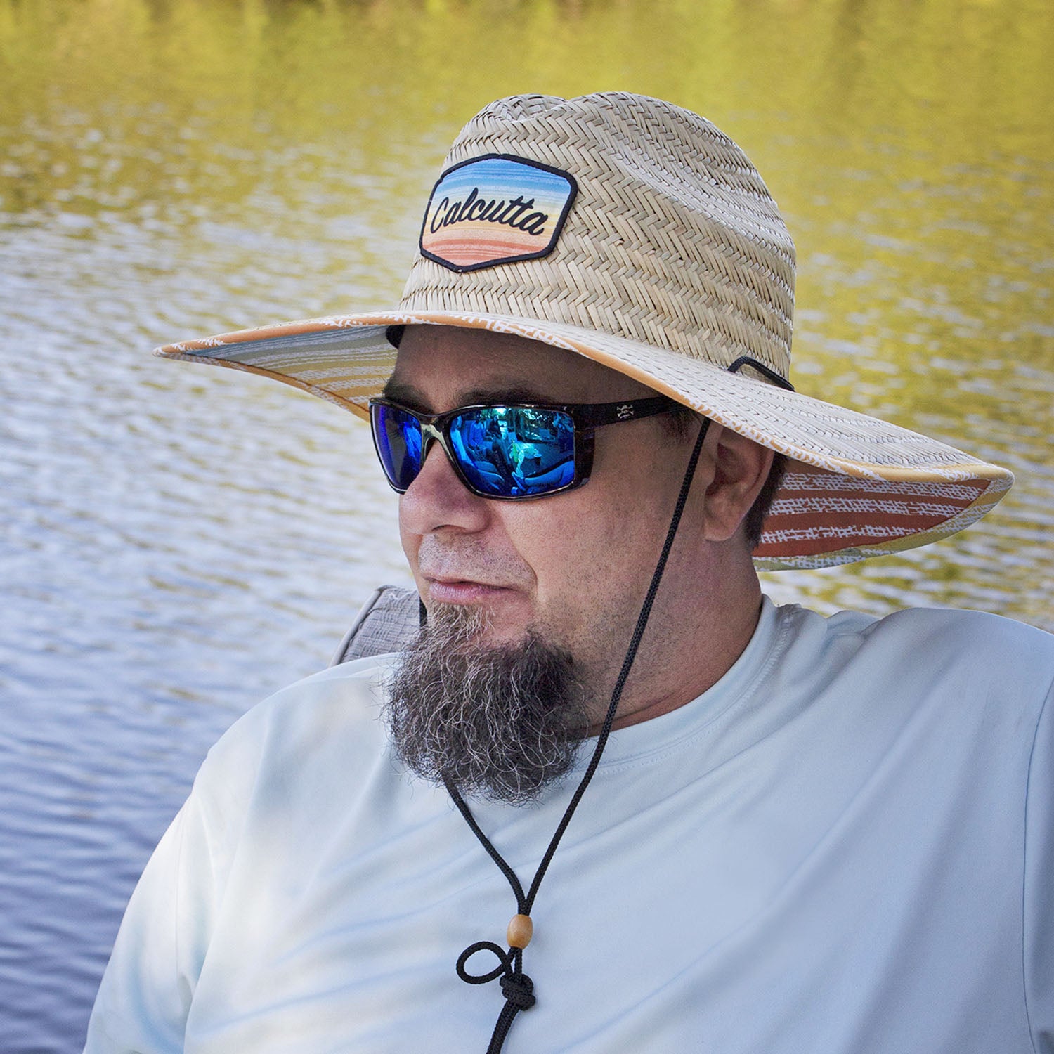 Man wearing Calcutta straw hat