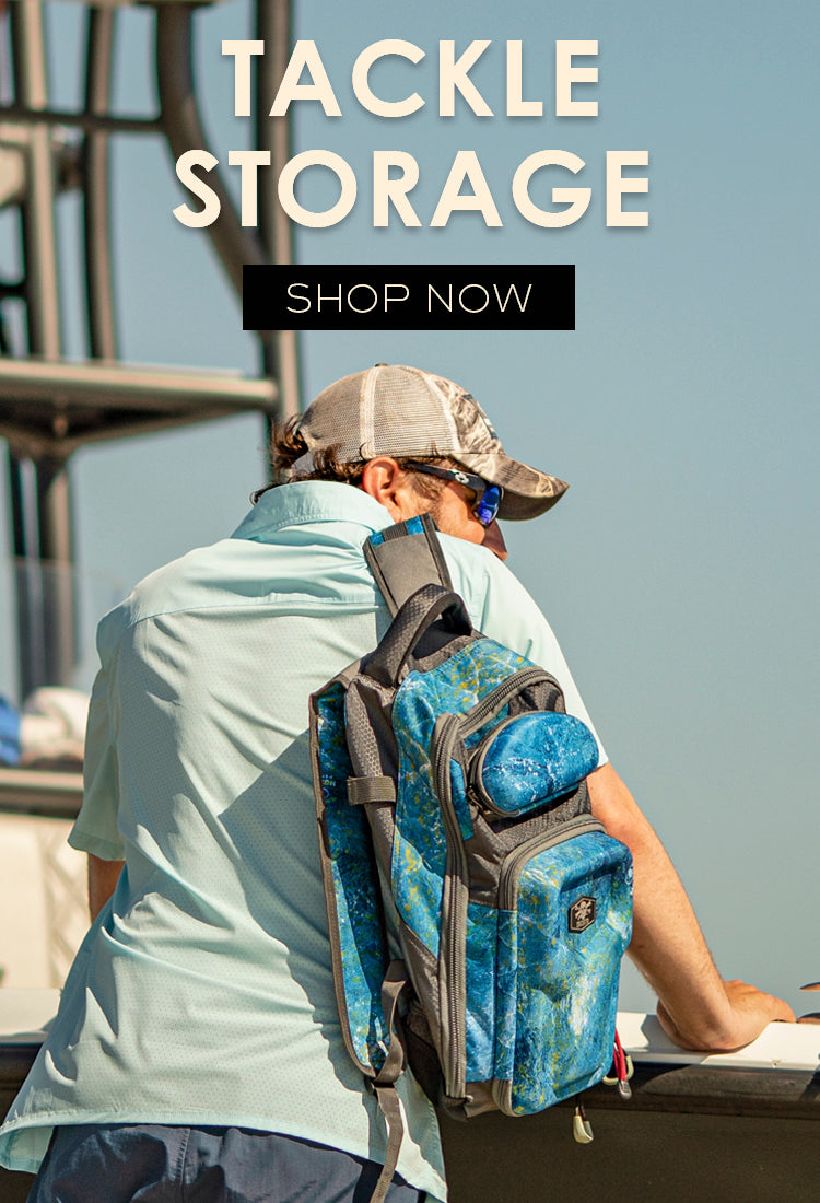 Man standing by with Calcutta tackle backpack