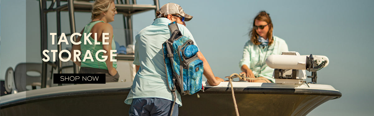 Man standing by with Calcutta tackle backpack