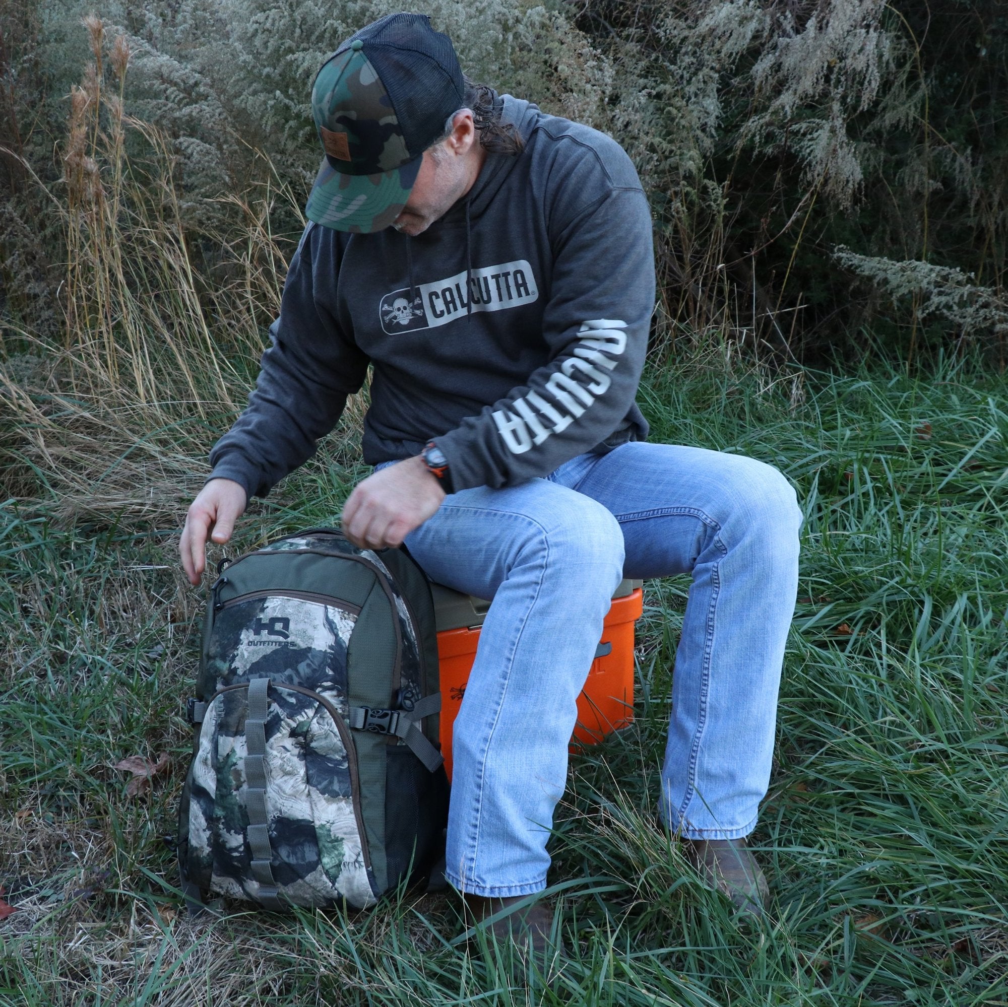 Outdoorsman wearing Calcutta sweatshirt