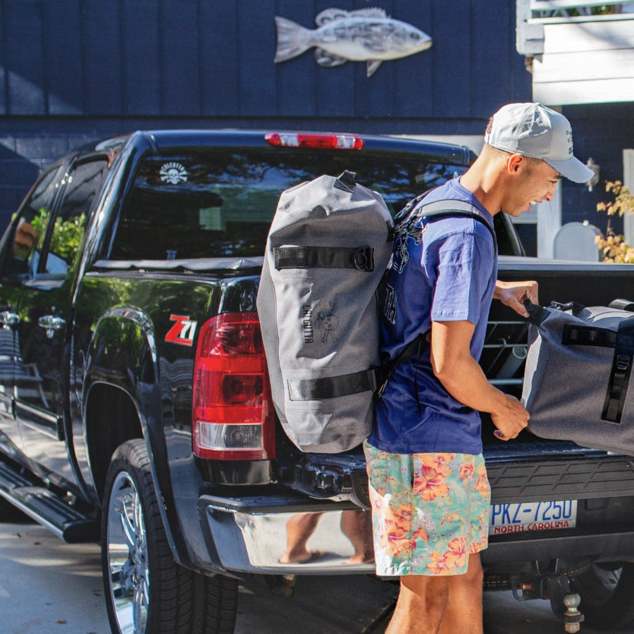 Calcutta waterproof duffle backpack on traveler