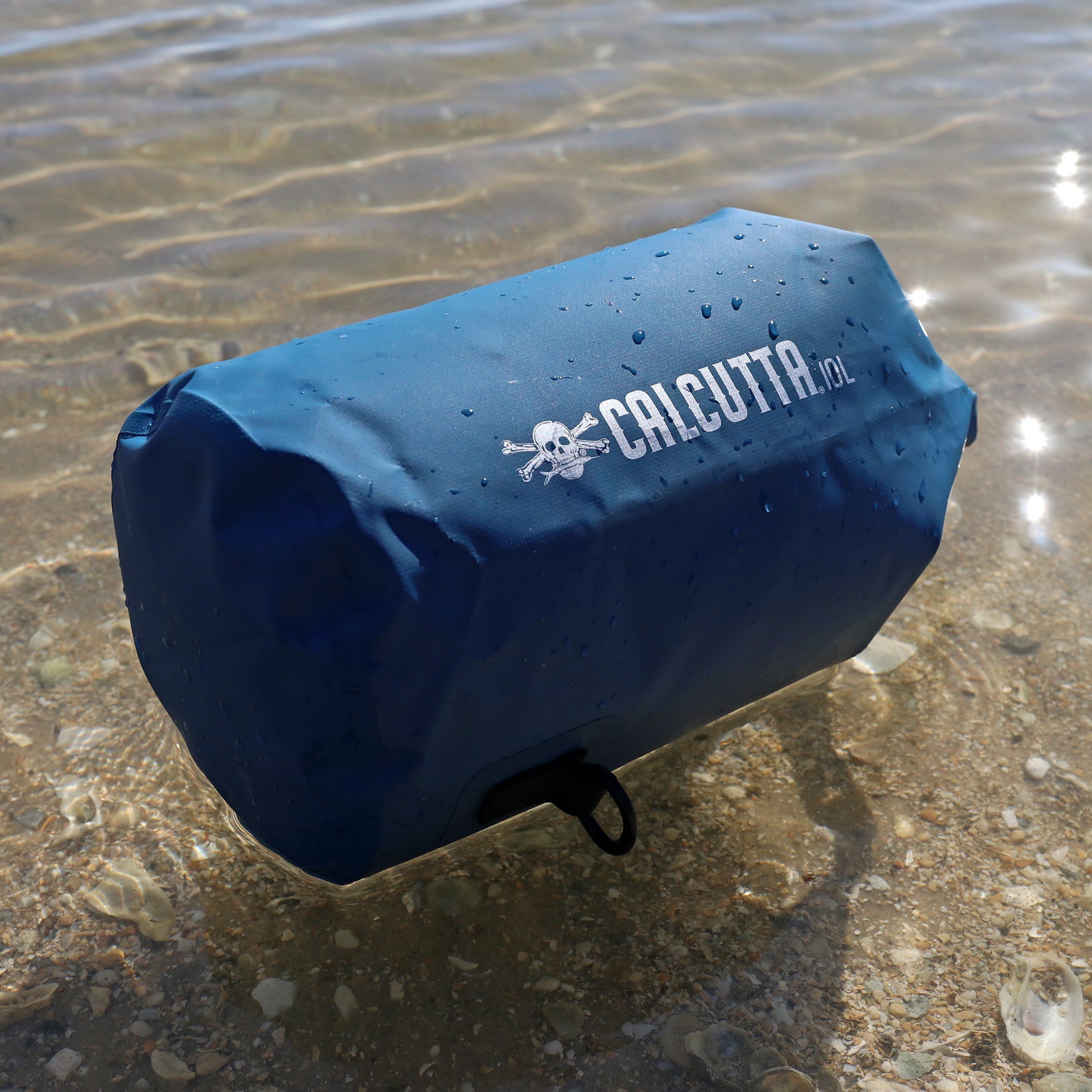 Calcutta dry bag 10L blue floating on water