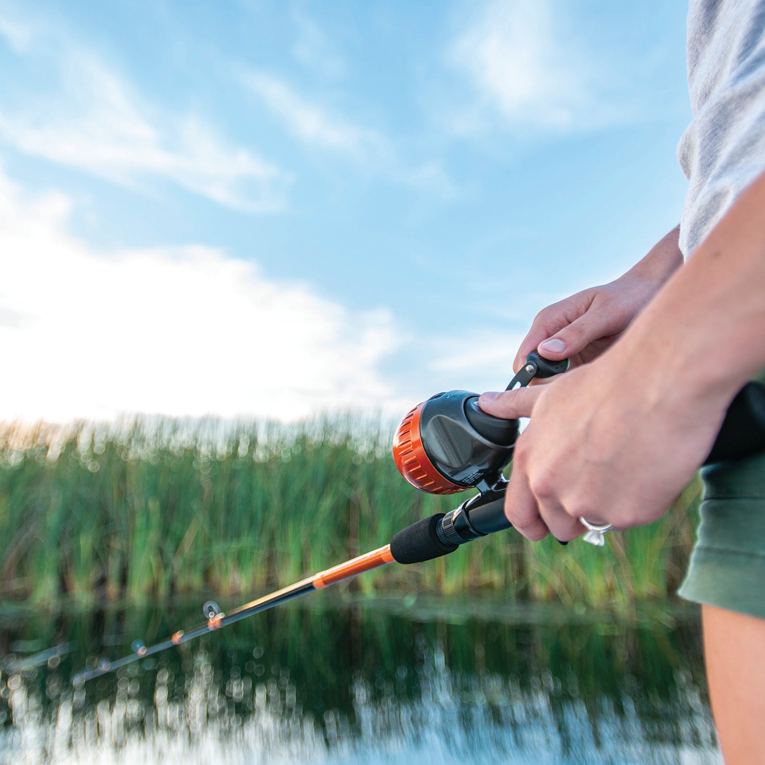 South Bend Neutron spincast combo fishing in pond
