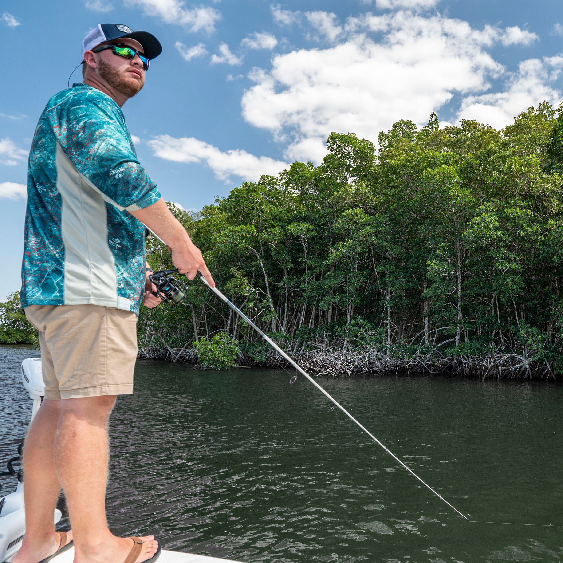 Fisherman with Kunnan Calico Jack inshore spinning rod