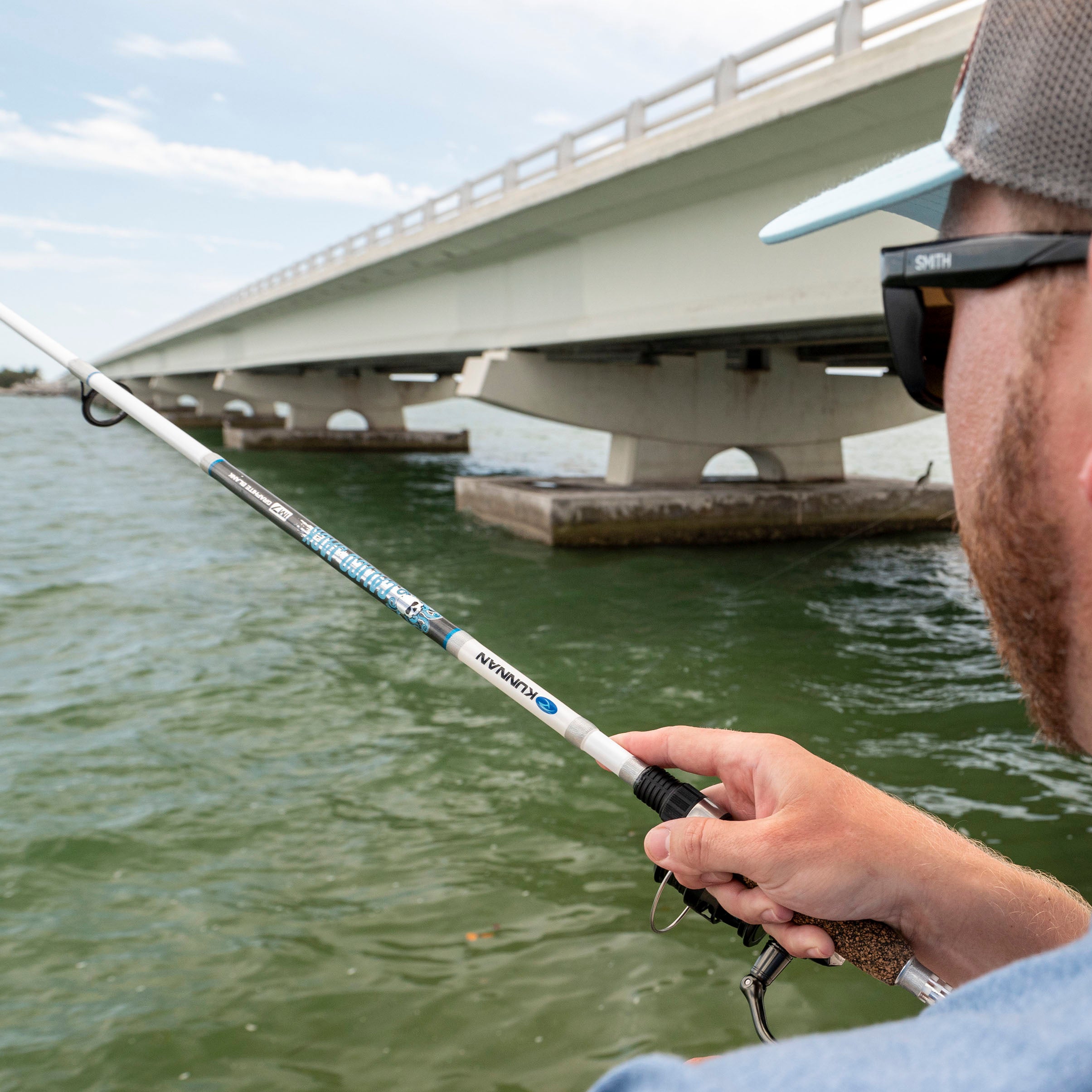 Kunnan Calico Jack inshore spinning rod fishing from bridge